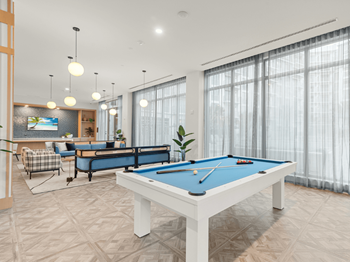Club room with lounge seating, sports bar and billiards